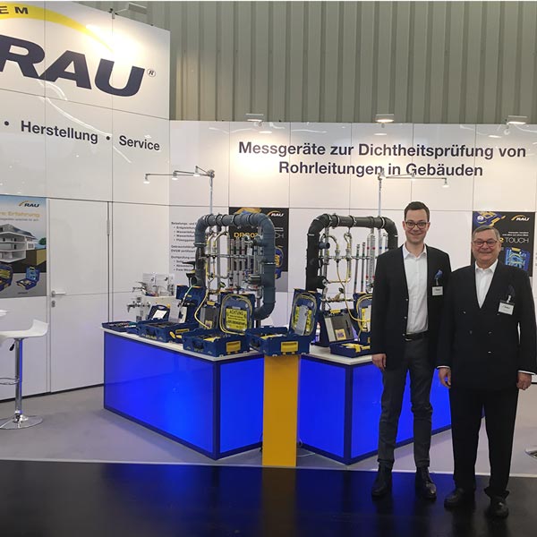 Messebild der Firma RAU auf der IFH in Nürnberg mit den Geschäftsführern Franz und Frederik Rau